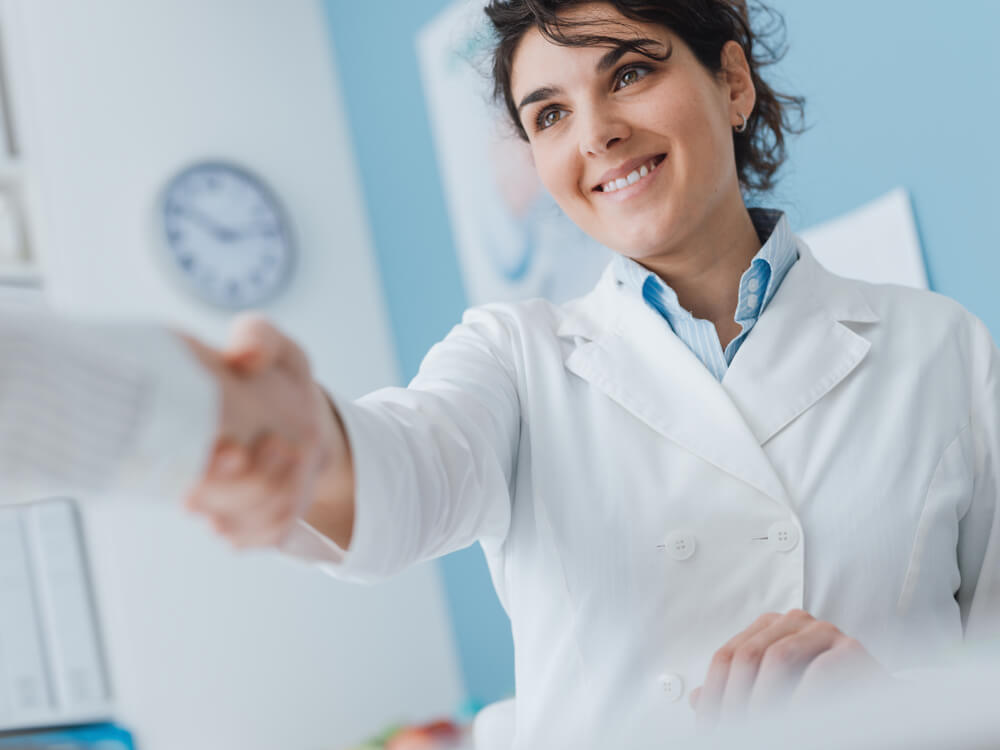 Doctor welcoming a patient