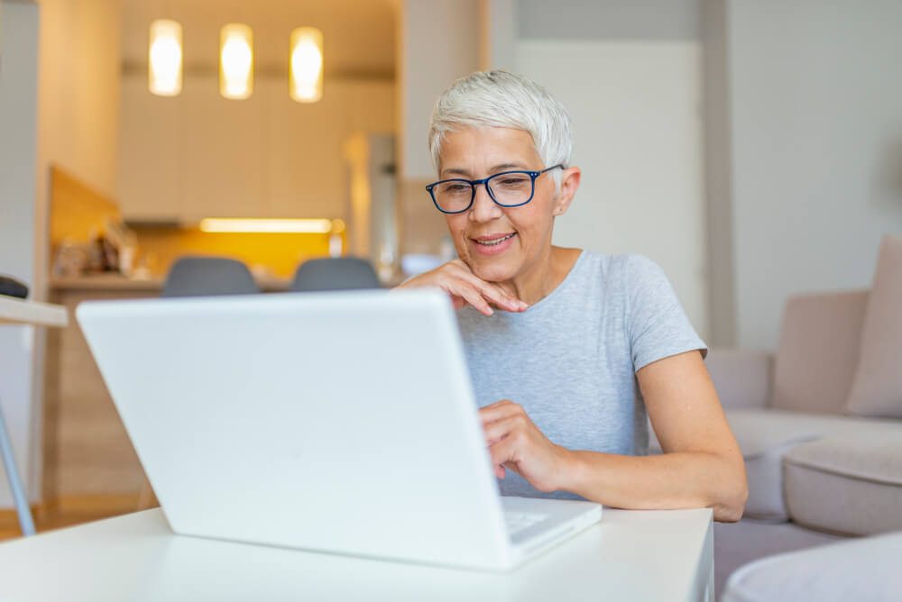 woman researching what she will ask at the visit